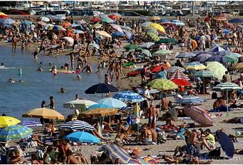 Crowded beach at Menton on the French Riviera